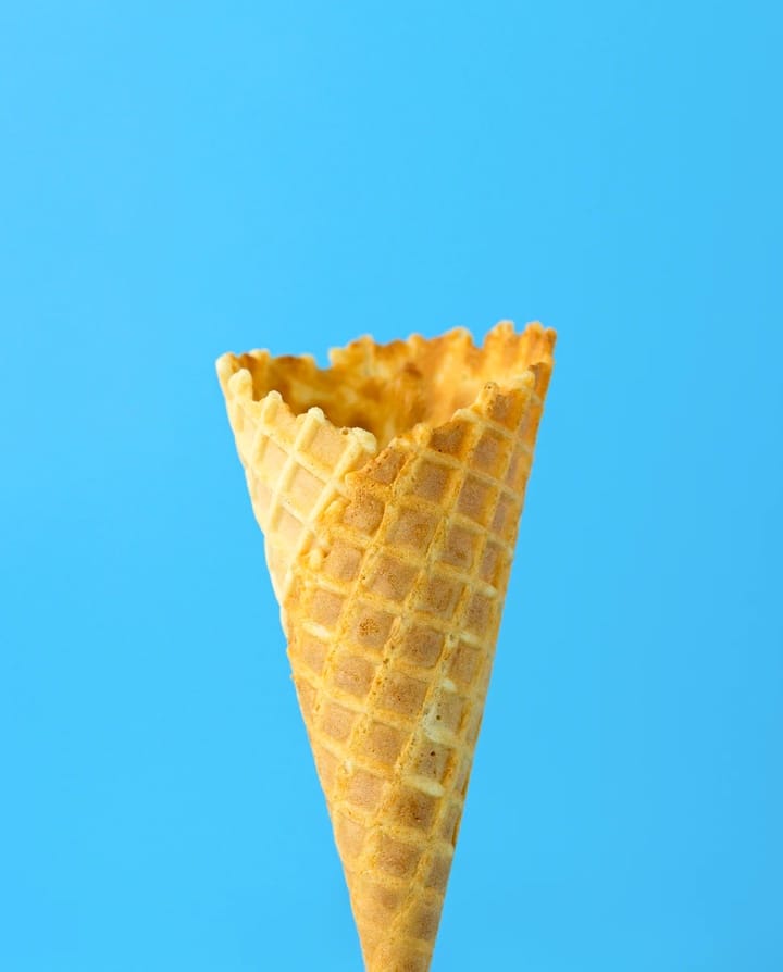 An icecream cone on the blue background